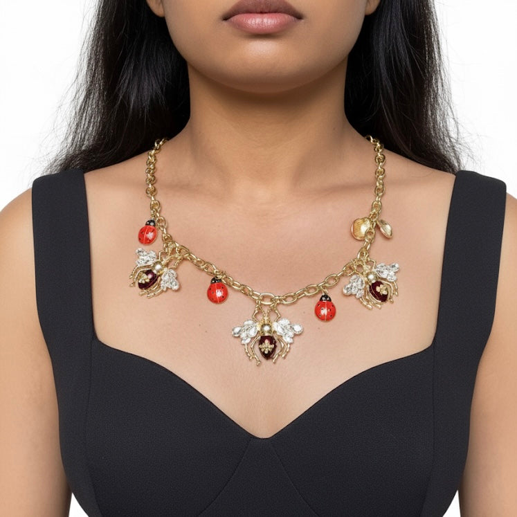 Model wearing BeatleFly statement necklace, contemporary Beatles and Housefly inspired jewellery