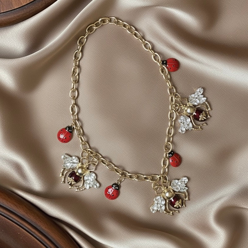 BeatleFly statement necklace inspired by Beatles and Housefly, bold contemporary jewellery