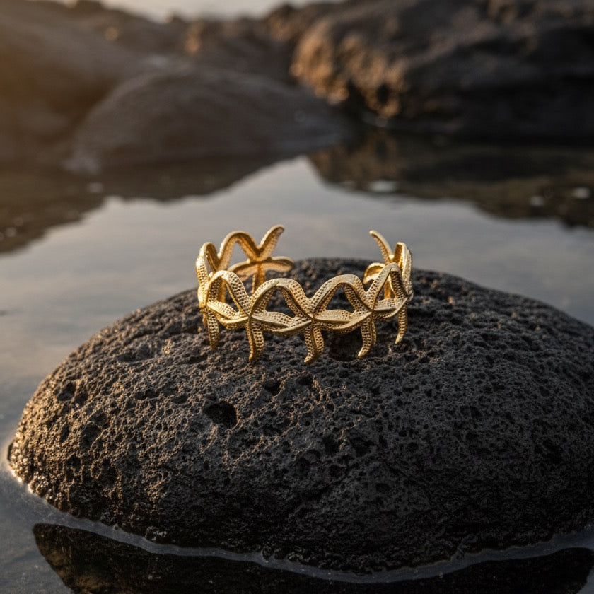 Gold starfish bracelet, adjustable gold bangle, beach-inspired jewelry, stylish gold bracelet, summer accessory, anti-tarnish bangle, trendy gold jewelry